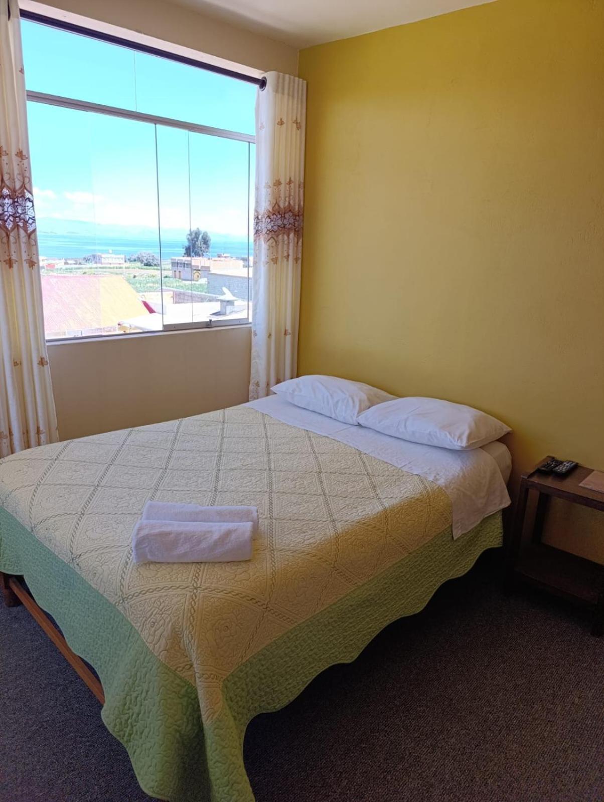 Hotel Summita Yunguyo Bagian luar foto